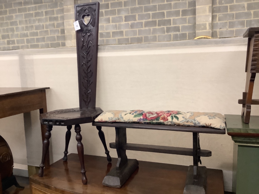A carved spinning stool, a chip carved cupboard and two further stools